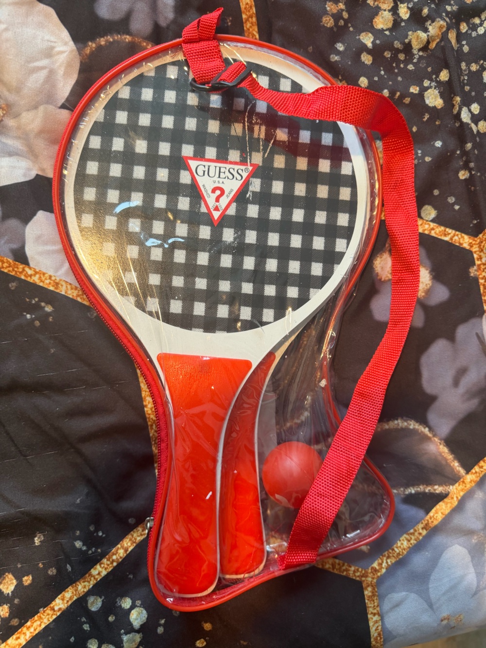 GUESS Red Handle Paddle Ball Set with Black & White Check Face